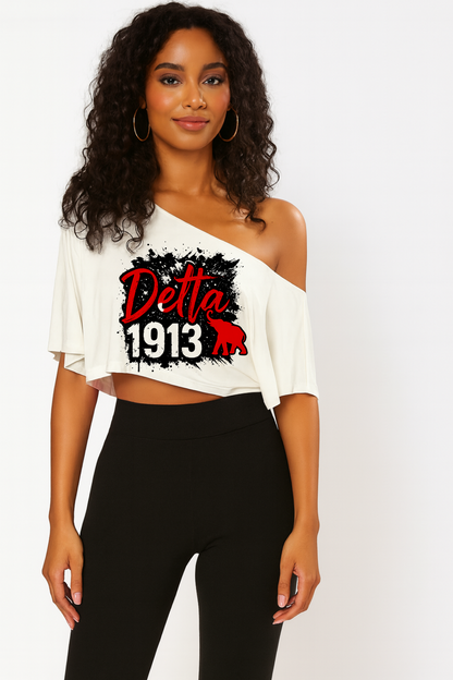 Delta Graphiti off the shoulder crop t-shirt